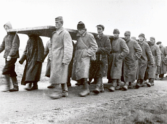 Soviet prisoners of war transporting sections of camp huts, autumn of 1941, Archives of the Zeithain Memorial Grove.